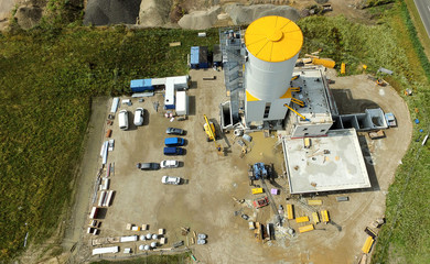 Construction site for the mixing plant of a factory for the production of concrete, air intake
