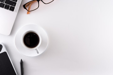 Graphic design table has ready hard working with black coffee in the morning.