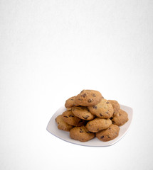 Cookies or Chocolate chips cookies on background.