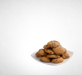 Cookies or Chocolate chips cookies on background.
