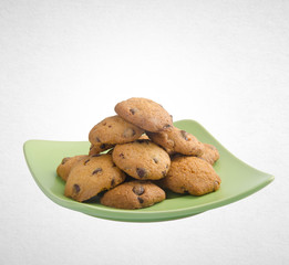 Cookies or Chocolate chips cookies on background.