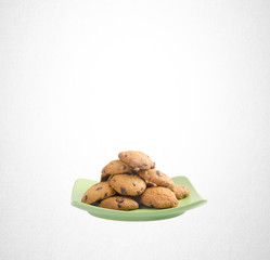 Cookies or Chocolate chips cookies on background.