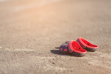 Sandals, flip-flops on the beach
