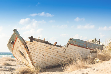 Wooden shipwreck on a beach in Malia, Crete