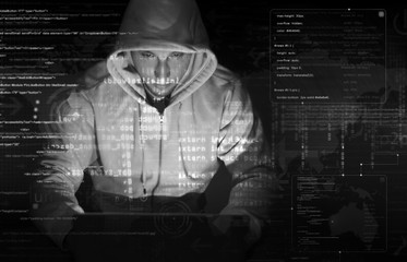 hacker at work with graphic user interface around