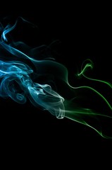 Abstract green and blue smoke on black background, smoke background,green and blue ink background,green and blue, beautiful color smoke