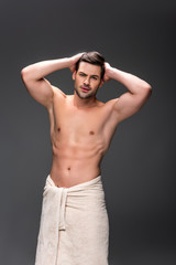 man covering with towel after shower