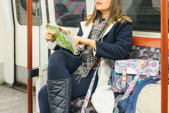 Woman traveling by subway