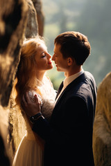 portrait of happy couple before kiss in sunset light. Love conce