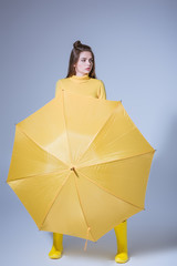 girl with yellow umbrella