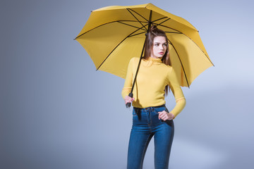 girl with yellow umbrella