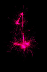"1" number drawn with bengali sparkles isolated on black background,number from sparkler on black background