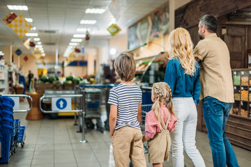 family shopping in supermarket