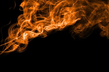 Abstract color smoke on black background, orange smoke background,orangeink background,orange smoke, beautiful color smoke