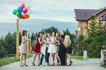Obraz premium Young beautiful happy women celebrate bachelorette party at the pier