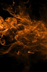 Abstract color smoke on black background, orange smoke background,orangeink background,orange smoke, beautiful color smoke