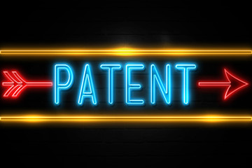 Patent  - fluorescent Neon Sign on brickwall Front view