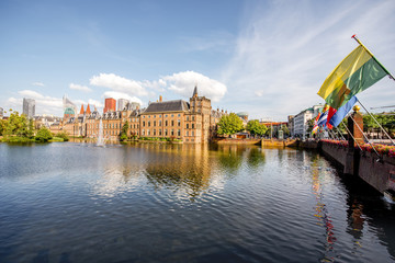 Cityscape view on the small lake with beautiful old buildings and modern skyscrapers on the background in the centre of Haag city, Netherland