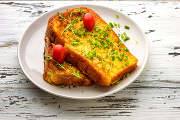 toasted slices of bread baguette with vegetables 