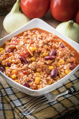 Chili con carne in a bowl.