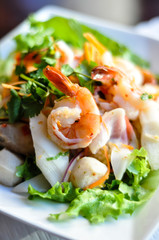 Seafood Salad, Mixed seafood, onion, carrot and cilantro in a spicy lime sauce.