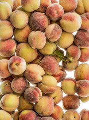 Bunch of fresh ripe peaches, isolated on white