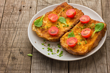 toasted slices of bread baguette with vegetables 