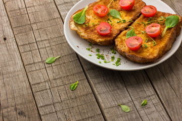 toasted slices of bread baguette with vegetables 