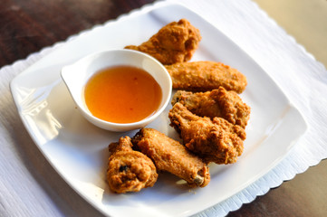 Chicken Wings, Deep fried chicken wings lightly marinated with our own homemade sauce.
