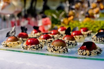 Rolgordijnen Buffet with snacks decorated in rustic style. © leo_nik