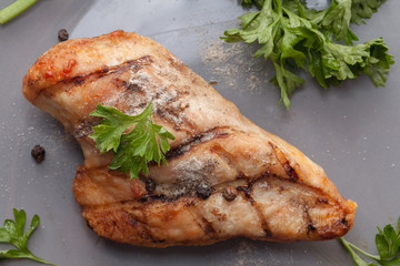 grilled chicken breast on plate