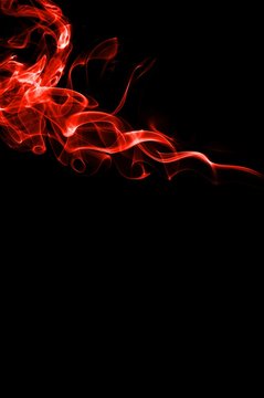 abstract red smoke on black background, red smoke on black background, smoke background,red ink background,red background ,beautiful red smoke