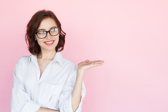 Woman In Shirt Holding Hand In Air