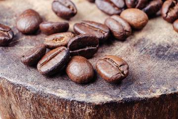 Coffee Bean on wood background with filter effect retro vintage style