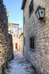 Fototapeta na wymiar The picturesque narrow streets of the old town of Ulcinj in Montenegro 