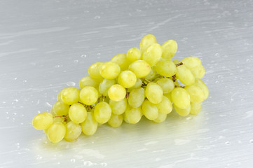 Cluster of White Muscat Grapes on Metal Background