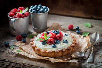 Tasty and aromatic tart with berries and mascarpone