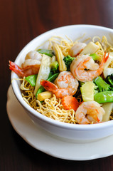 Goey See Me, Crispy egg noodle topped with broccoli, mushroom, bamboo shoot, peapod, carrot, baby corn in delicious gravy sauce