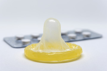 Condom and pills