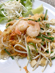 Fried noodle Thai style with prawns, Stir fry noodles with shrimp in Pad Thai , Thai noodle style, Traditional food.