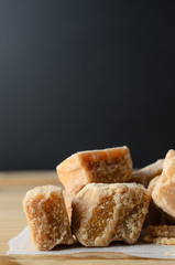 Fudge Pieces on Wood with Black Background