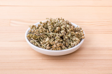 yarrow tea / Bowl of dried yarrow blossoms 
