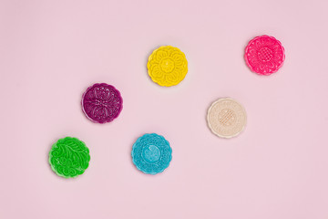 Table party setting. Traditional mid autumn festival colorful mooncakes.