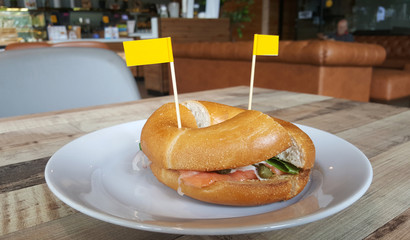 Smoked salmon with fresh vegetable with little yellow flags