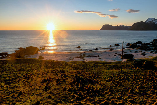 Scenic view of beautiful midnight sun in Norway.