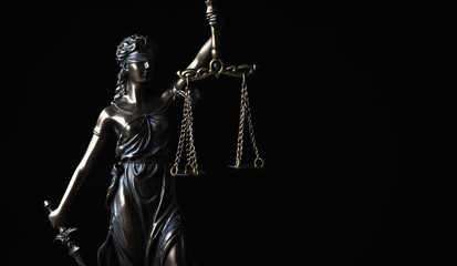 Fototapeta na wymiar Law and Justice symbols on dark background
