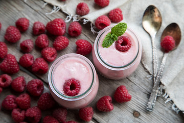 Yogurt smoothie with raspberries, fruit dessert. Berry smoothie. 