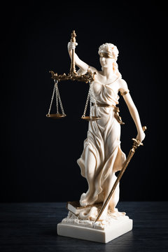 Law and Justice symbols on dark background