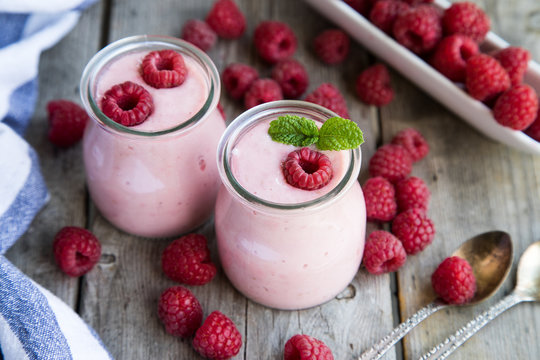 Yogurt smoothie with raspberries, fruit dessert. Berry smoothie. 