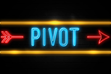 Pivot  - fluorescent Neon Sign on brickwall Front view